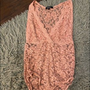 Pink lace body suit